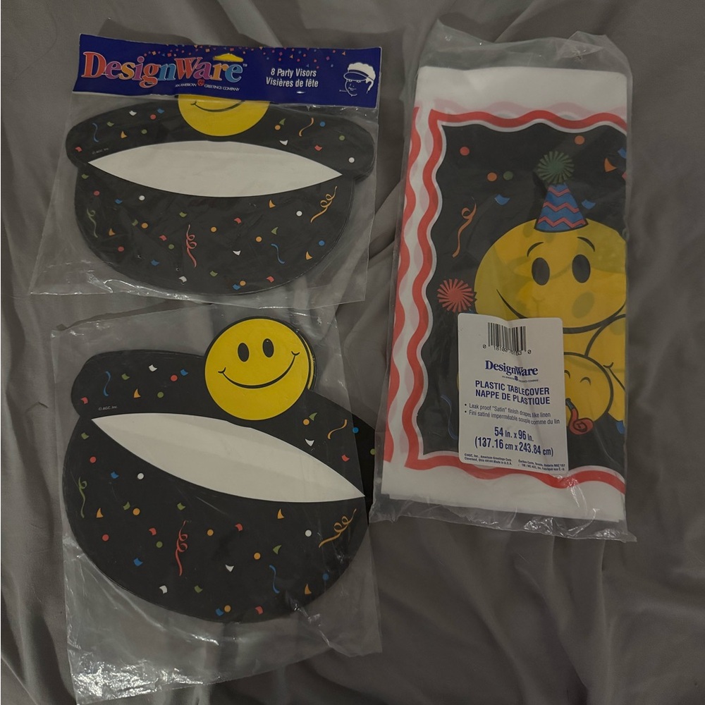 DesignWare Smiley Face Party Supplies Set - visors and tablecloth
